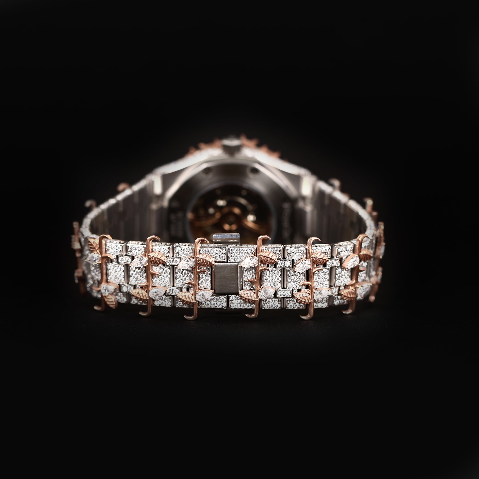 luxury wristwatch with iced dial and bold designer style bracelet
