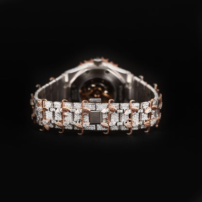 luxury wristwatch with iced dial and bold designer style bracelet