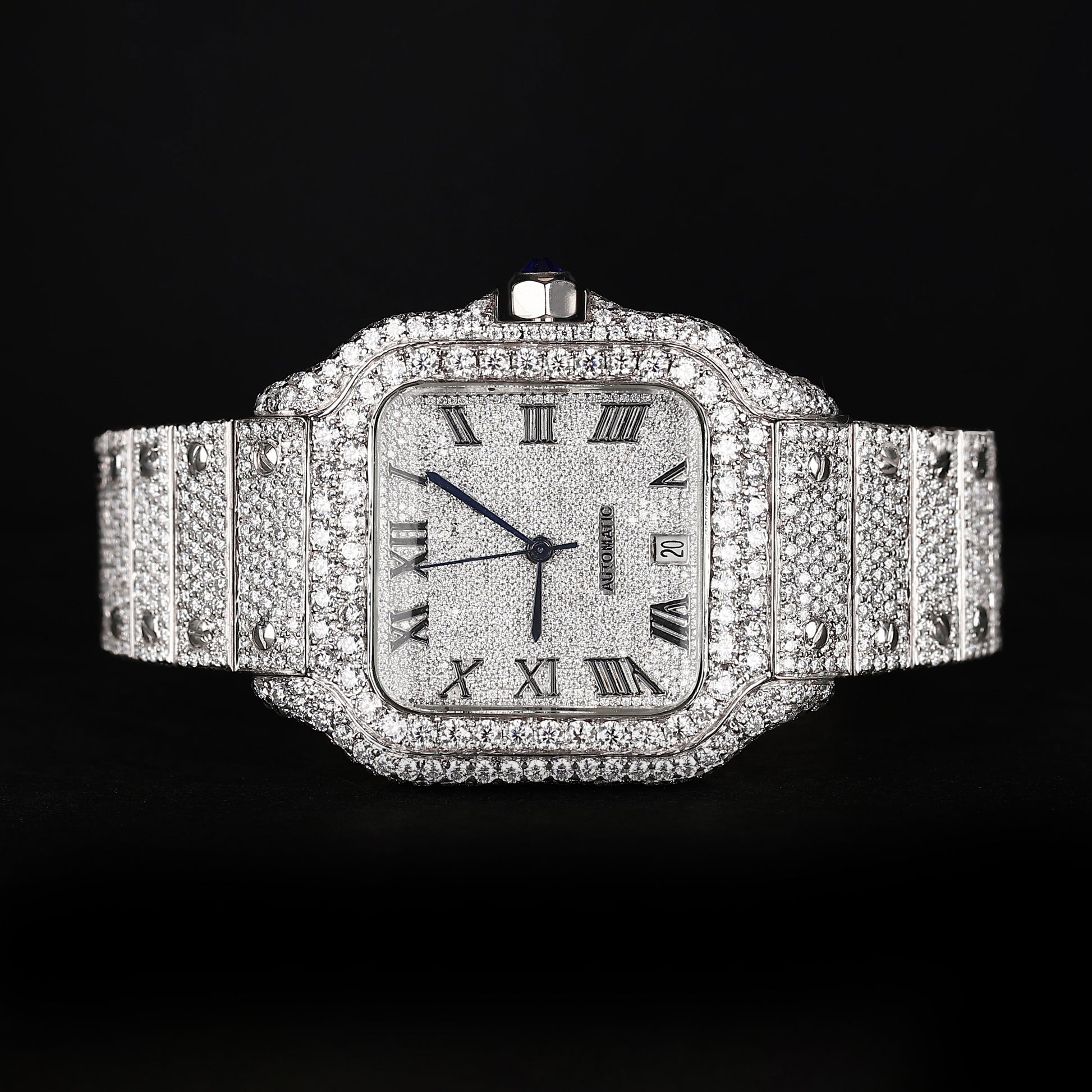 automatic luxury watch with iced out bracelet and clean white dial