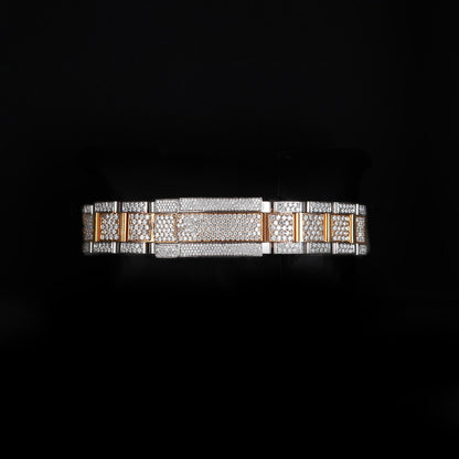 white and yellow wristwatch with diamond style stones and bold luxury look