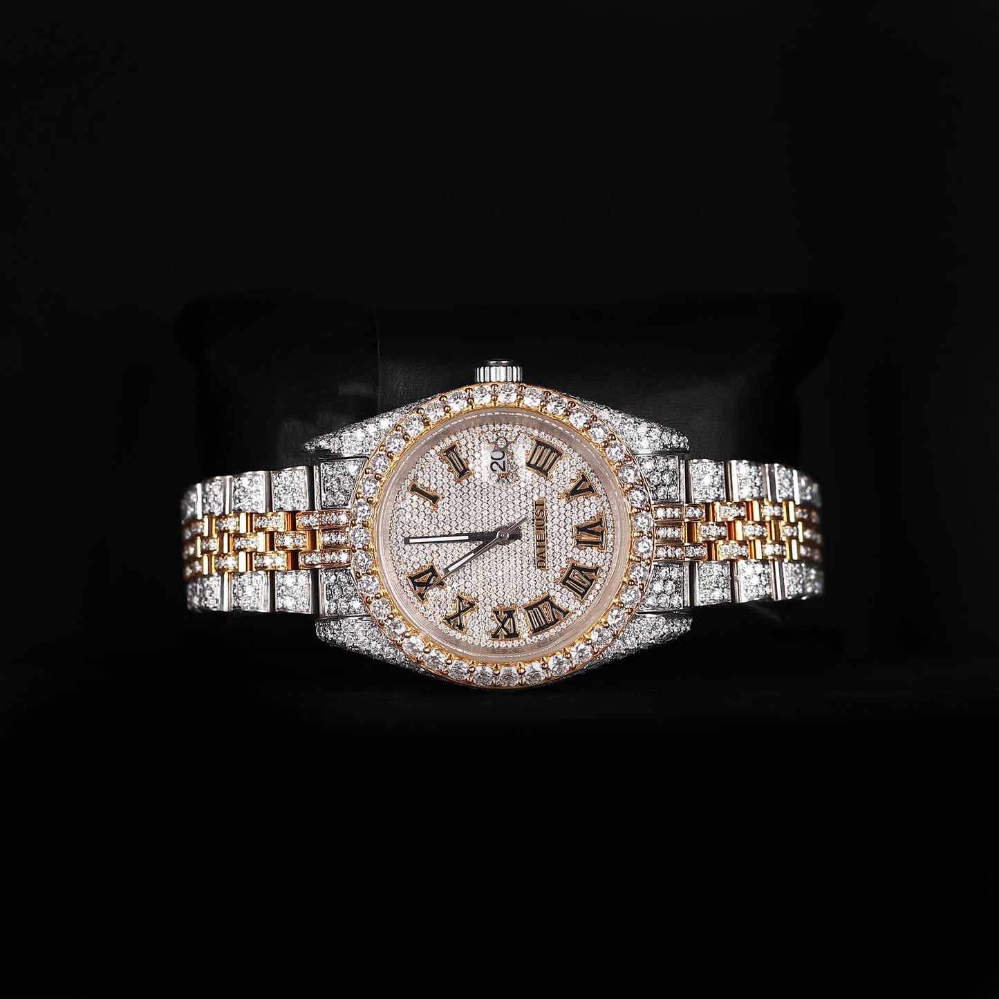 automatic luxury watch with full iced bracelet and roman dial close up