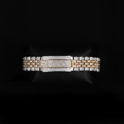 white and yellow wristwatch with diamond style stones and bold luxury look
