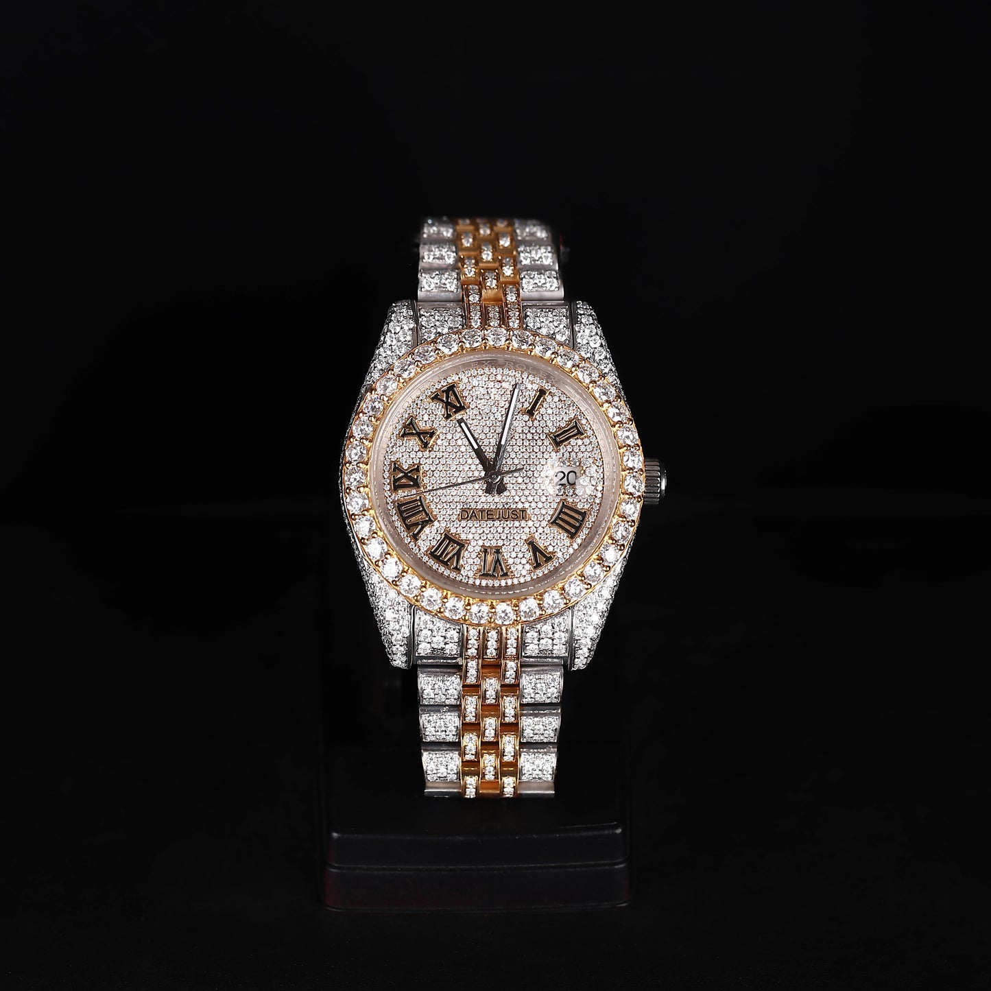 white and yellow iced out watch with roman numeral dial and full diamond shine