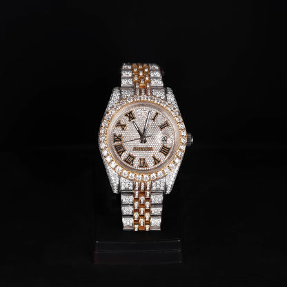 white and yellow iced out watch with roman numeral dial and full diamond shine