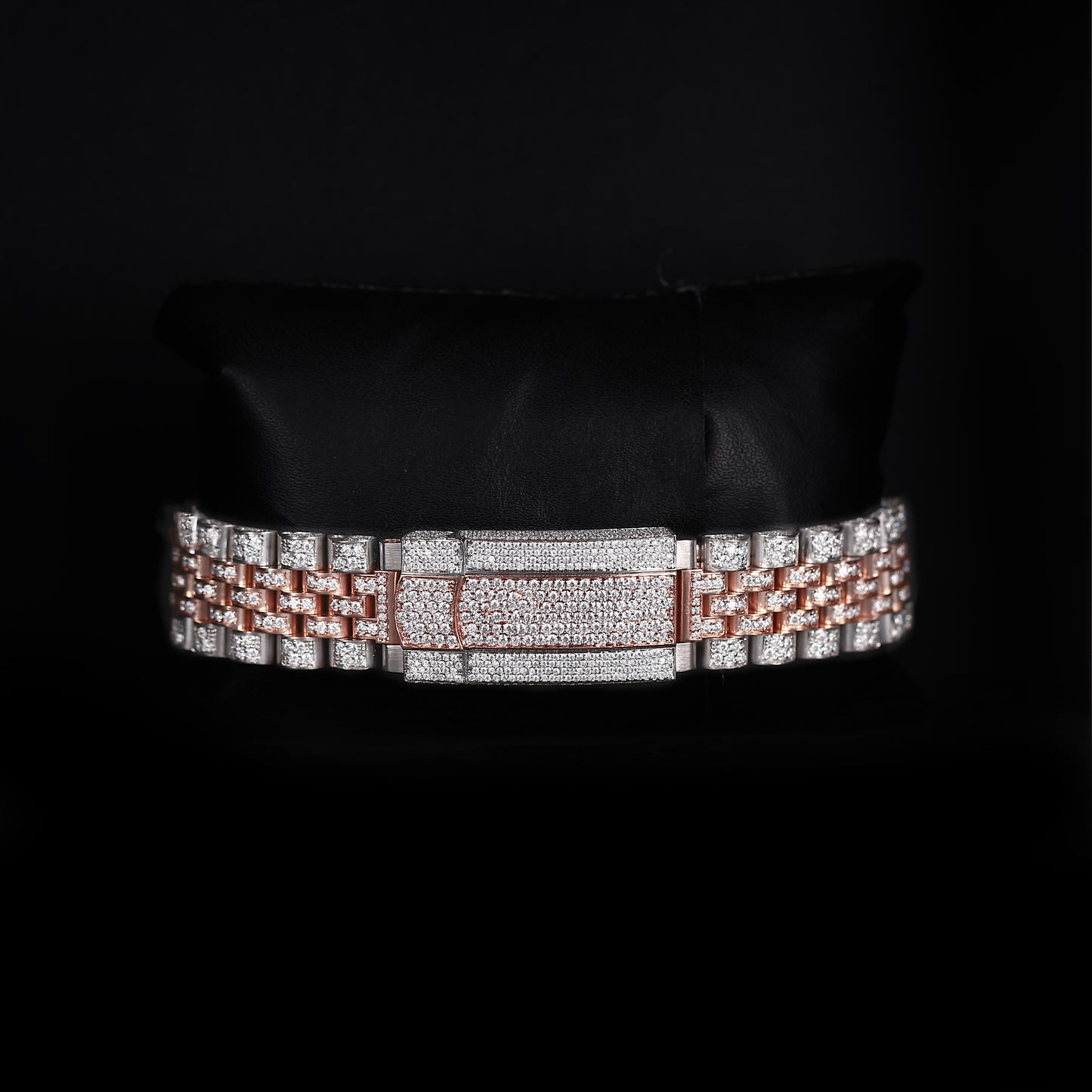 automatic luxury watch with full iced bracelet and roman dial close up