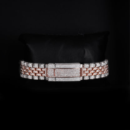 automatic luxury watch with full iced bracelet and roman dial close up