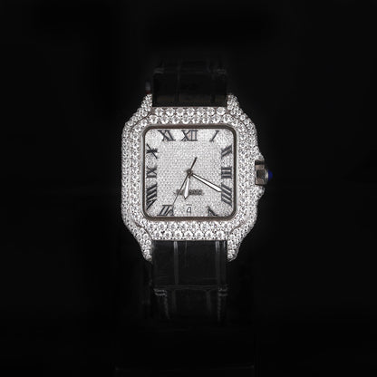 iced out square watch with black leather strap and roman numeral dial