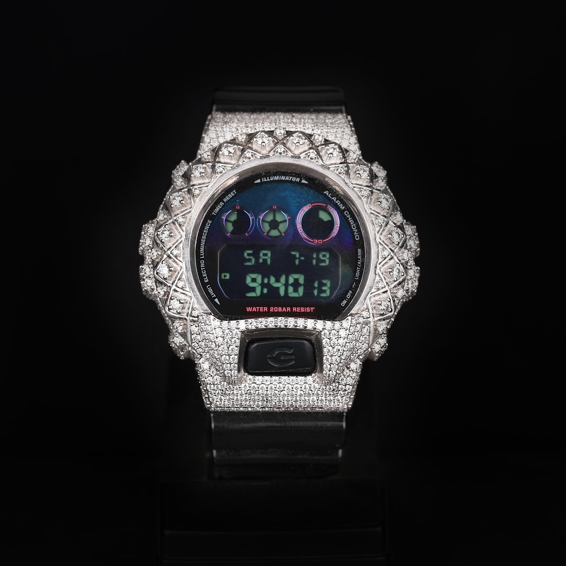 iced digital watch with rubber strap and diamond covered case