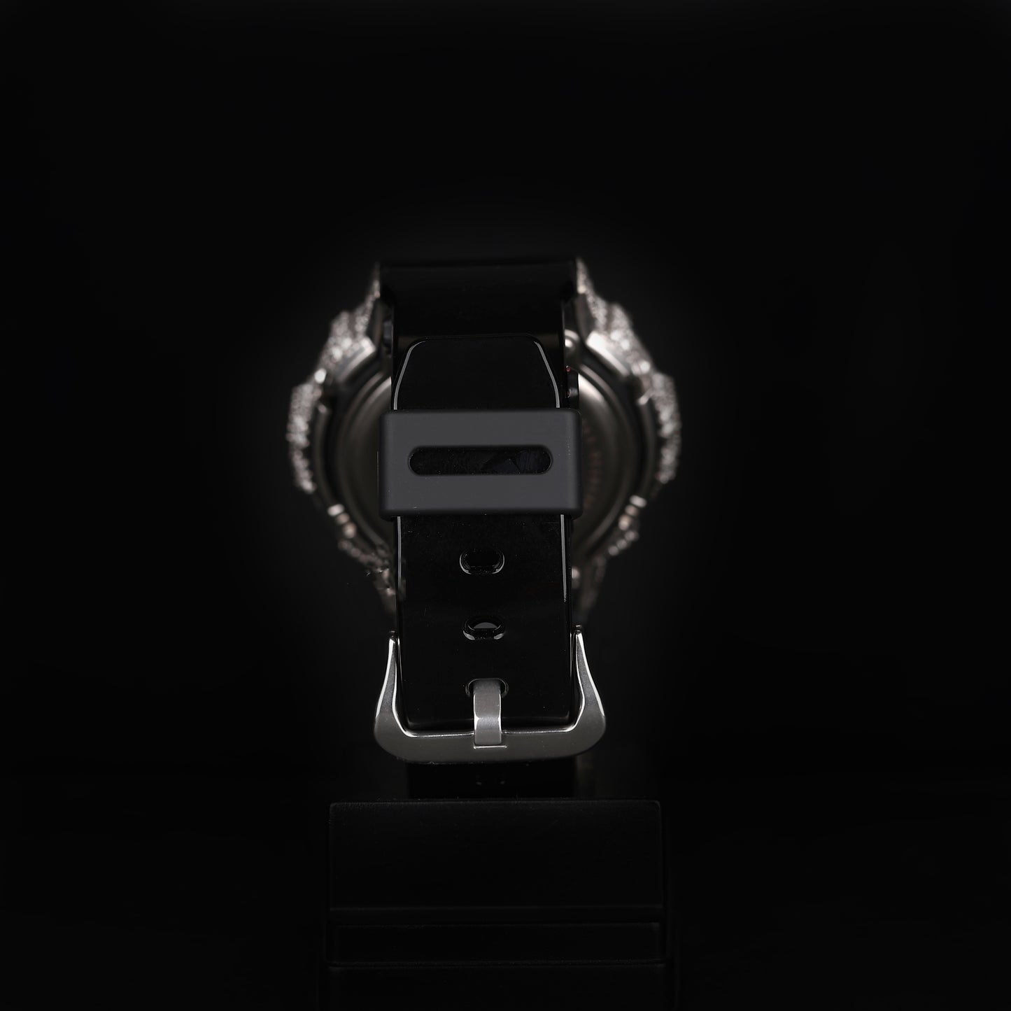 iced sport wristwatch with rubber strap and illuminated digital dial
