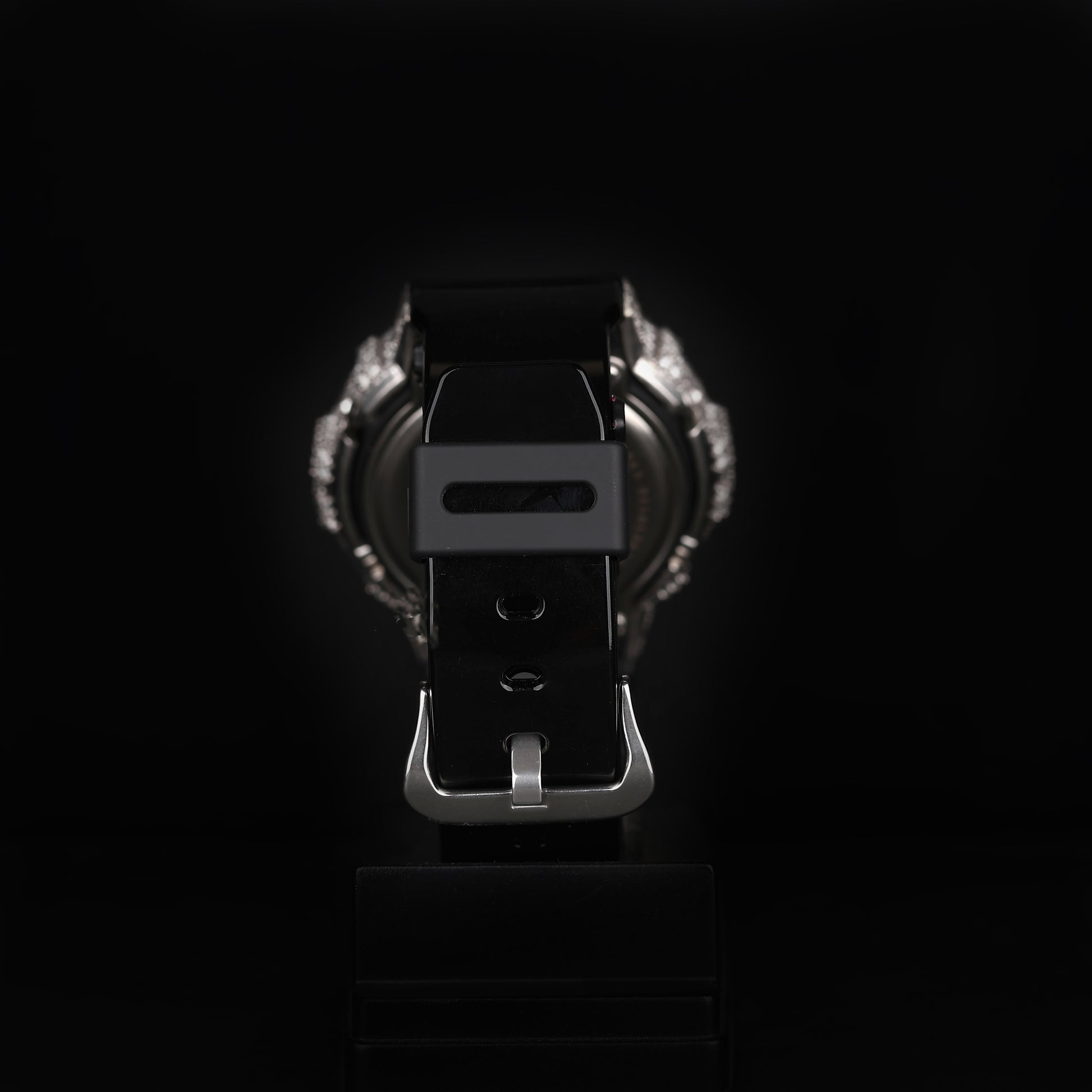 iced sport wristwatch with rubber strap and illuminated digital dial