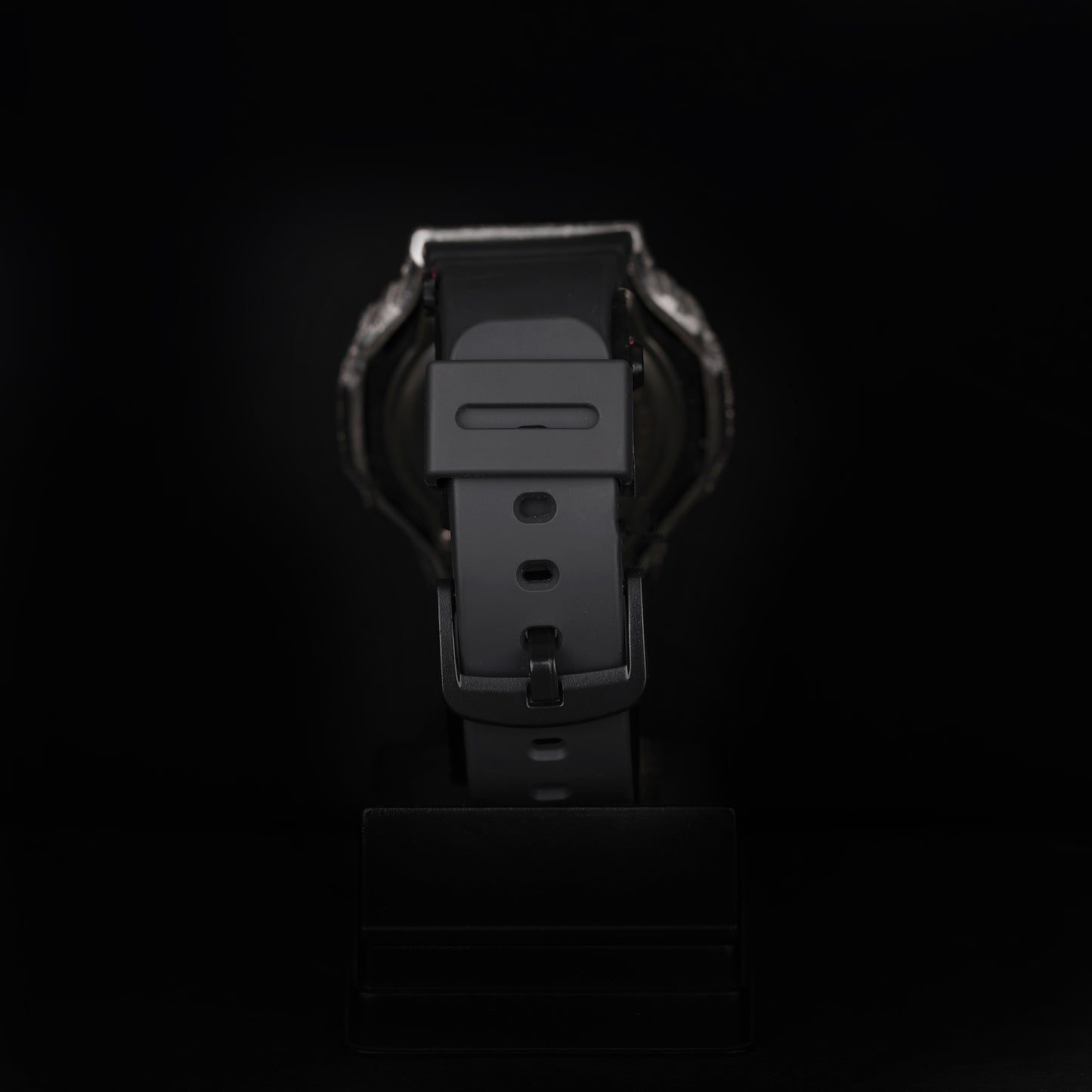 iced sport wristwatch with rubber strap and illuminated digital dial