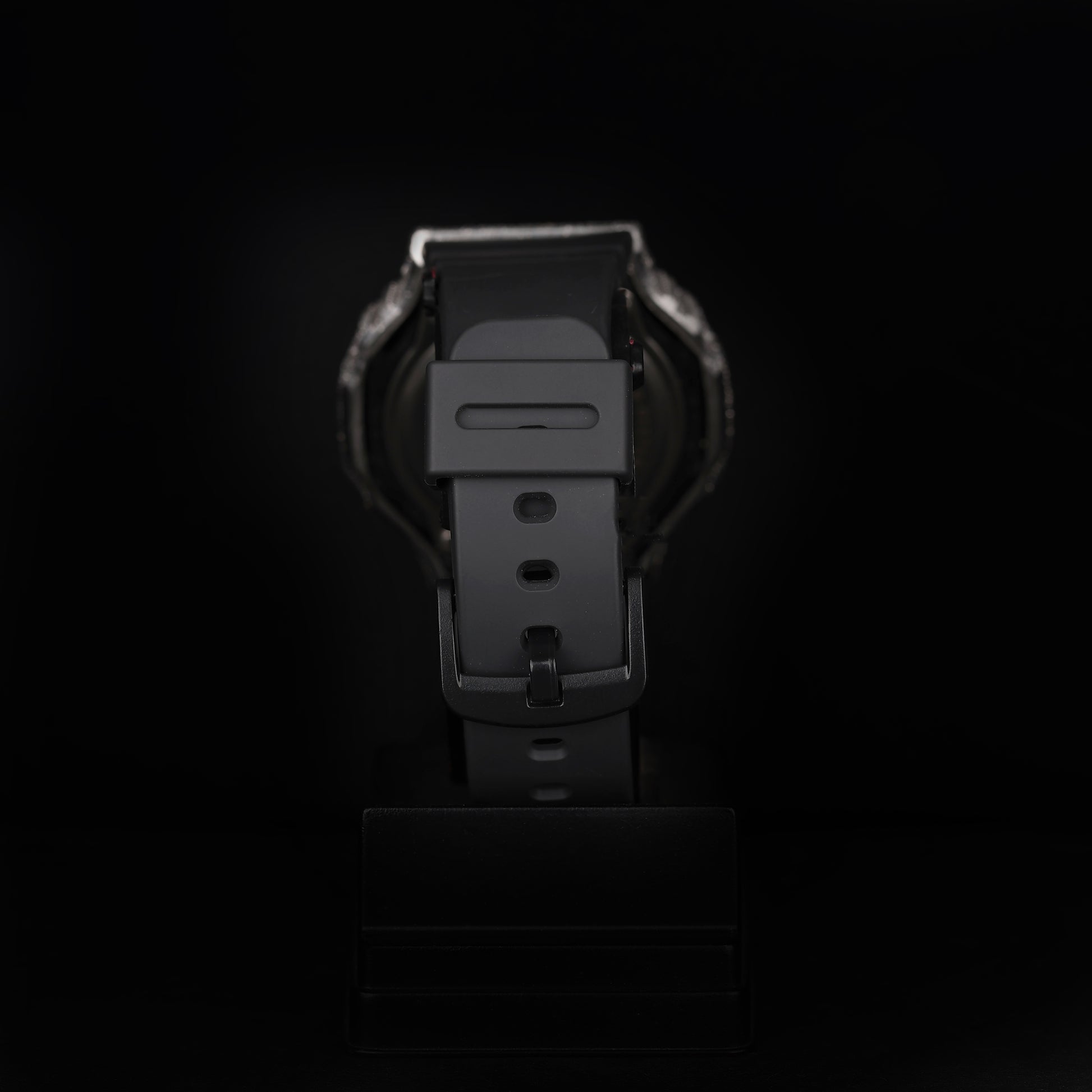 iced sport wristwatch with rubber strap and illuminated digital dial