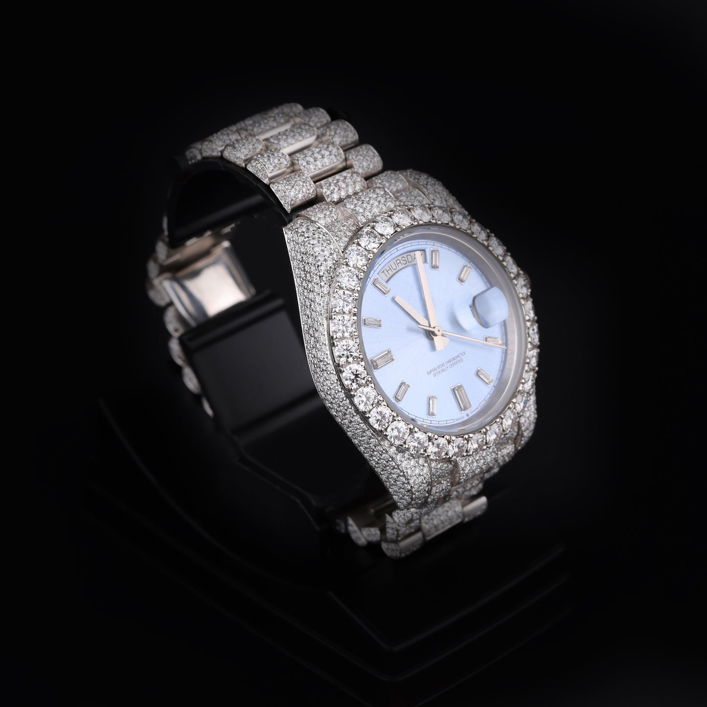 premium iced wristwatch with light blue face and automatic movement