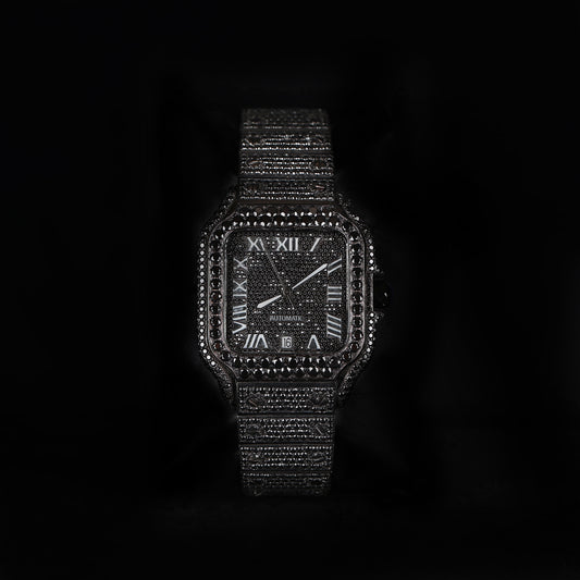 black iced out square watch with dark diamond style stones and roman dial