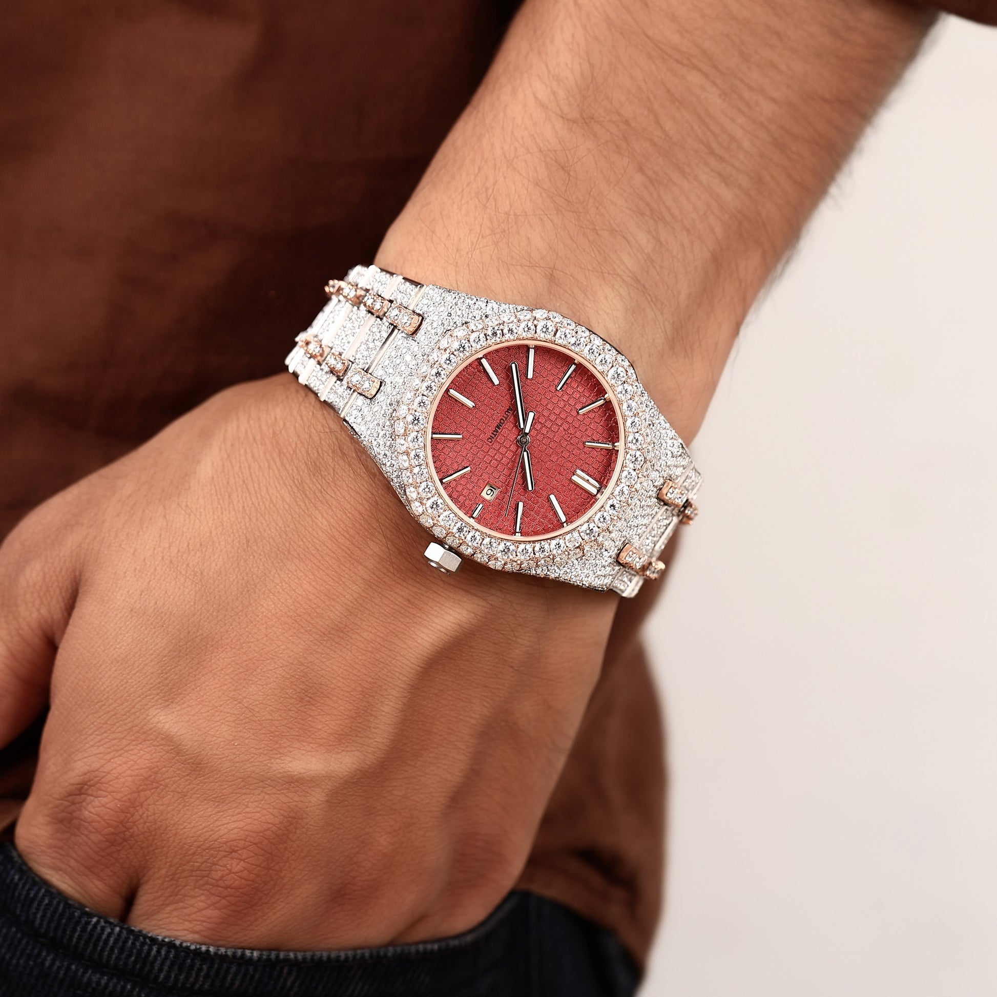 statement luxury watch with diamond setting and red dial