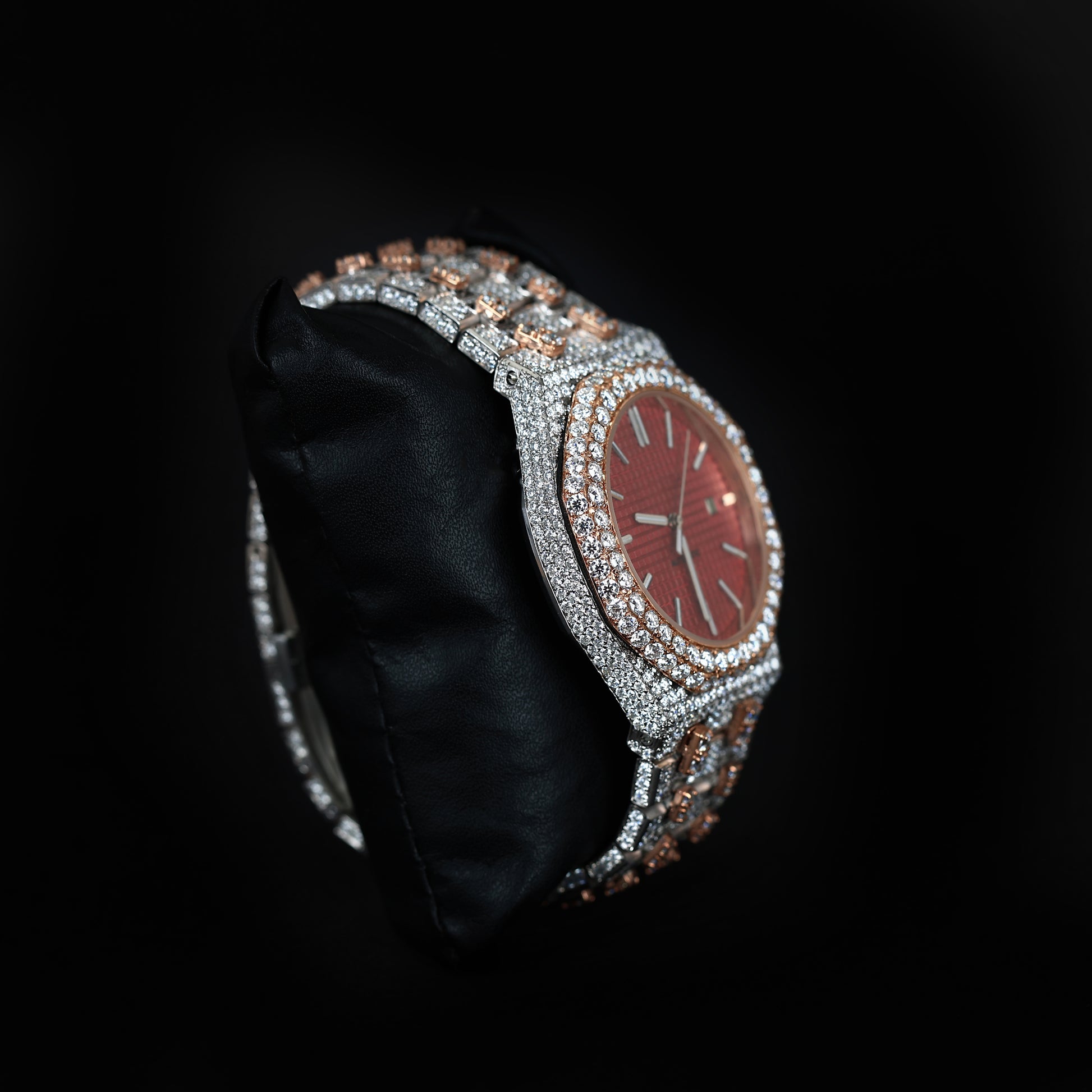 high end diamond watch with bold red dial and two tone finish