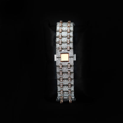 iced bezel wristwatch with red dial and luxury design