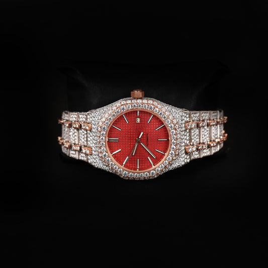 premium automatic watch with red face and fully iced bracelet