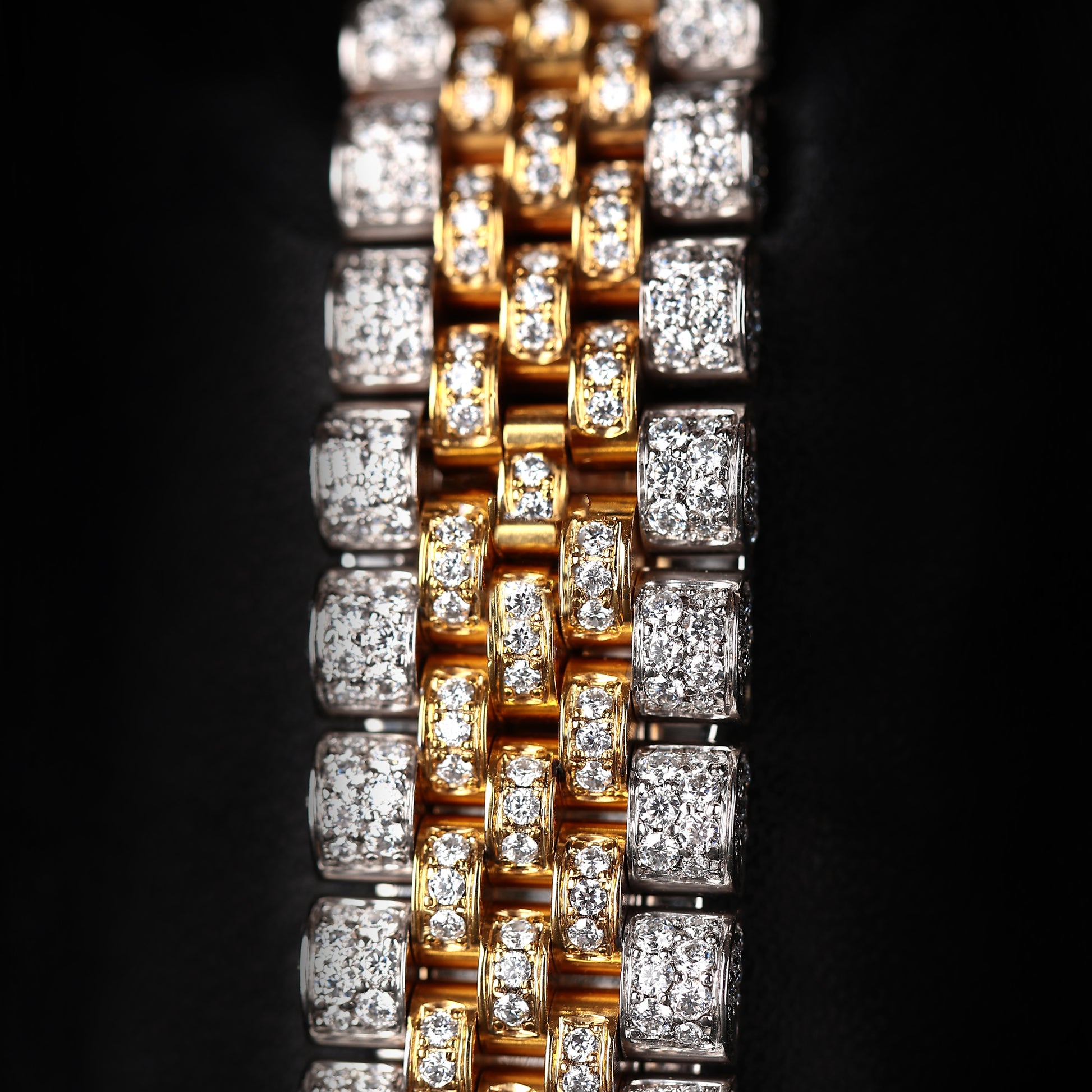 premium iced out watch with silver and yellow tone diamond setting