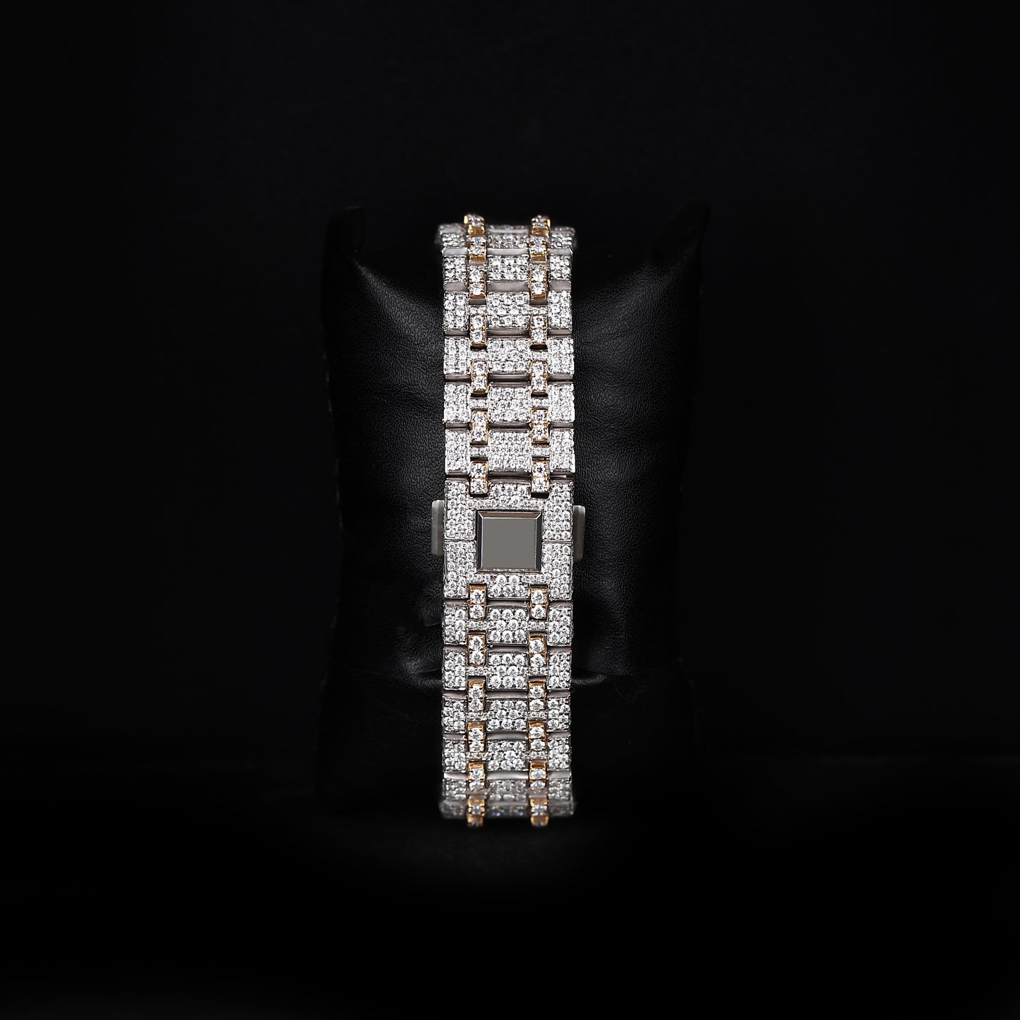 white and yellow wristwatch with diamond style stones and strong premium shine