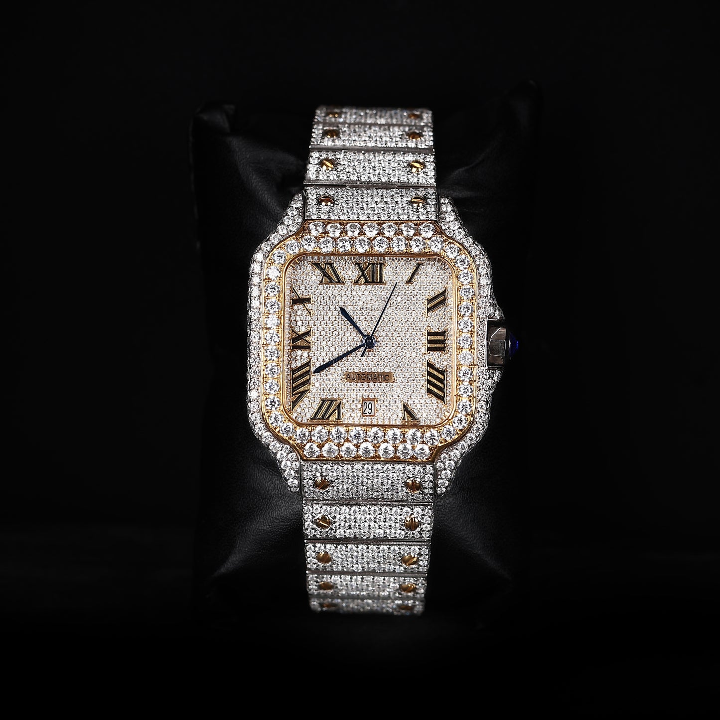 two tone iced out watch with white and yellow finish and roman dial luxury style