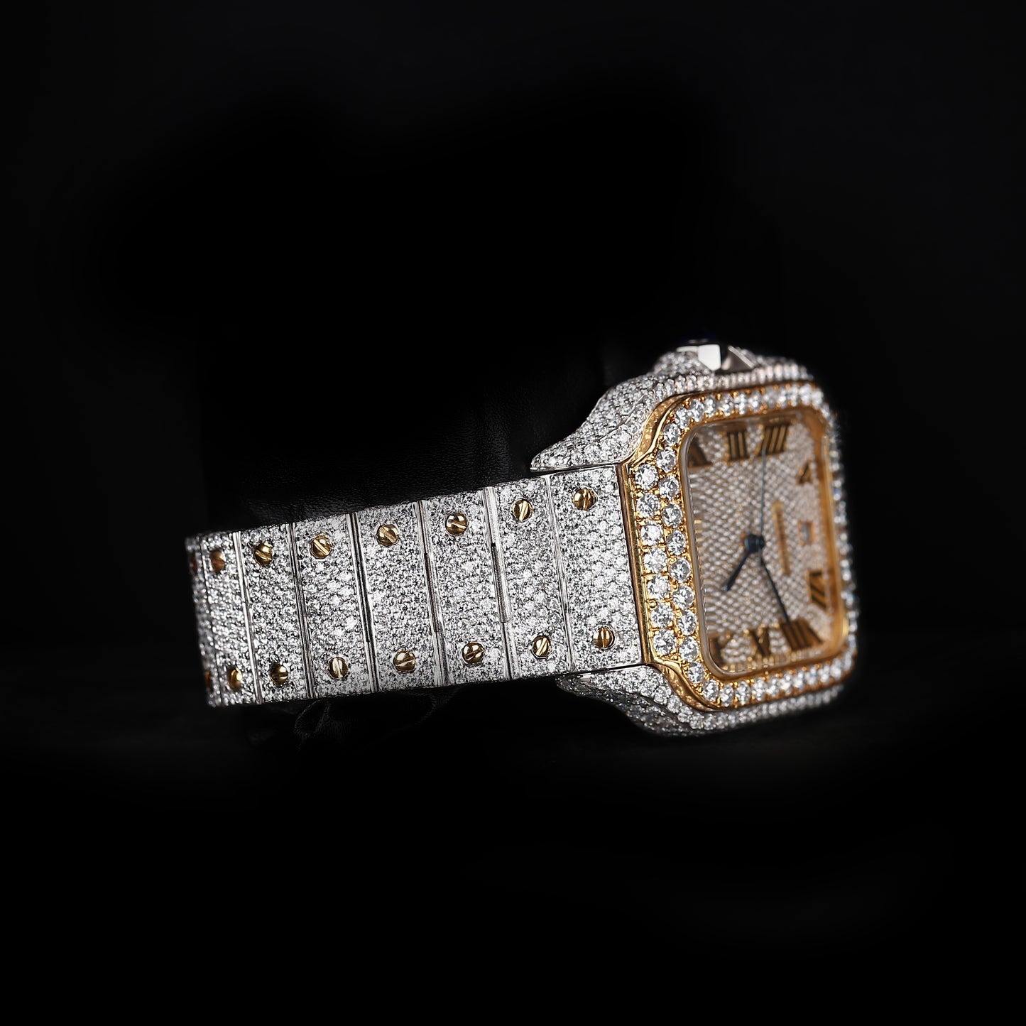 automatic luxury watch with iced out bracelet and detailed stone setting close up
