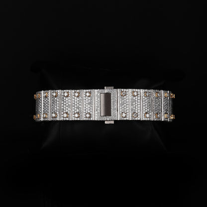 premium white and yellow wristwatch with diamond style stones and square dial