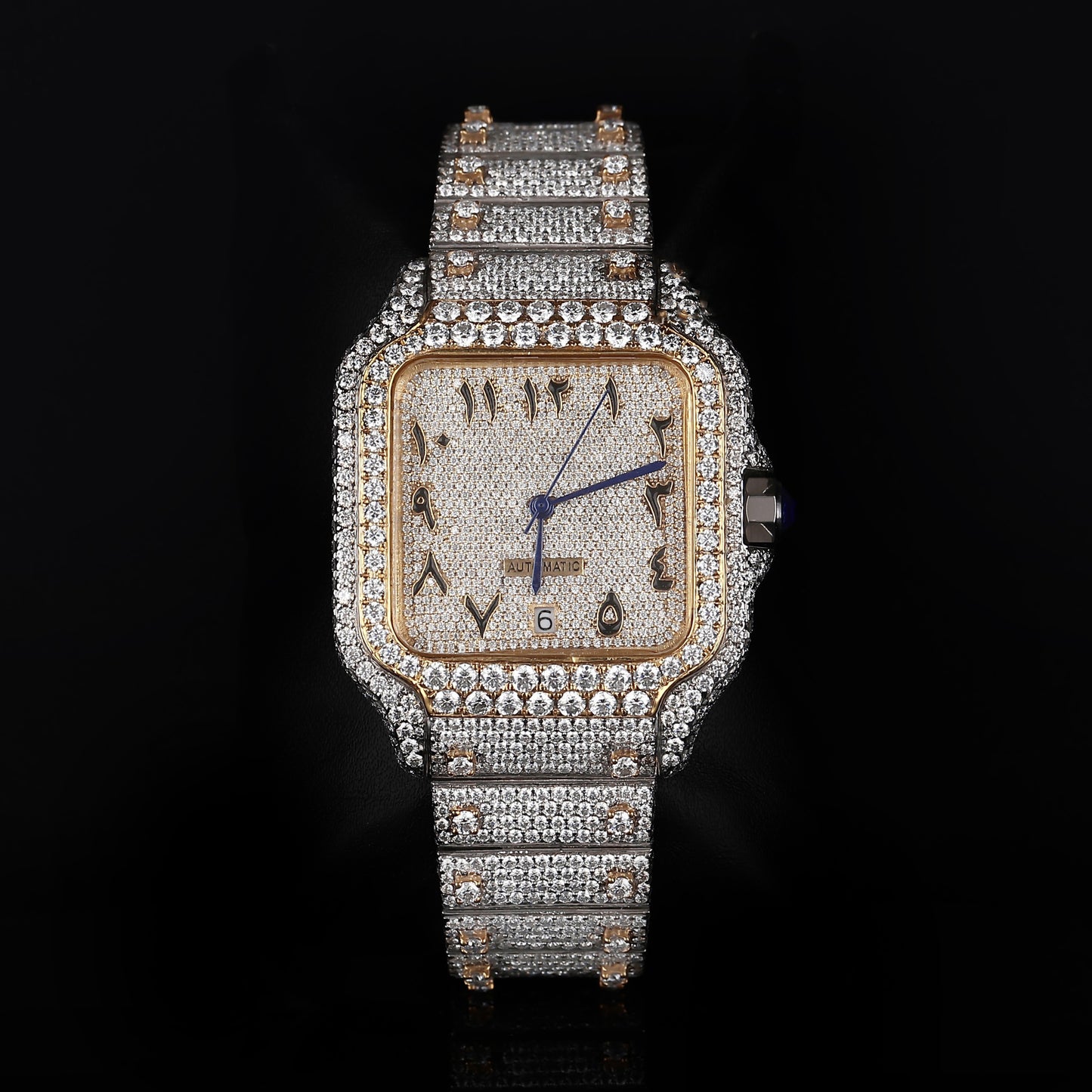 white and yellow iced out watch with arabic numeral dial and full diamond shine
