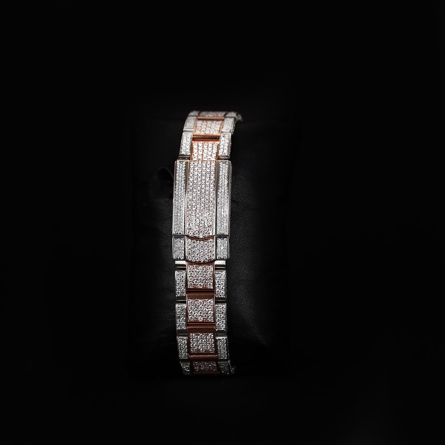 iced bezel wristwatch with two tone finish and elegant dial