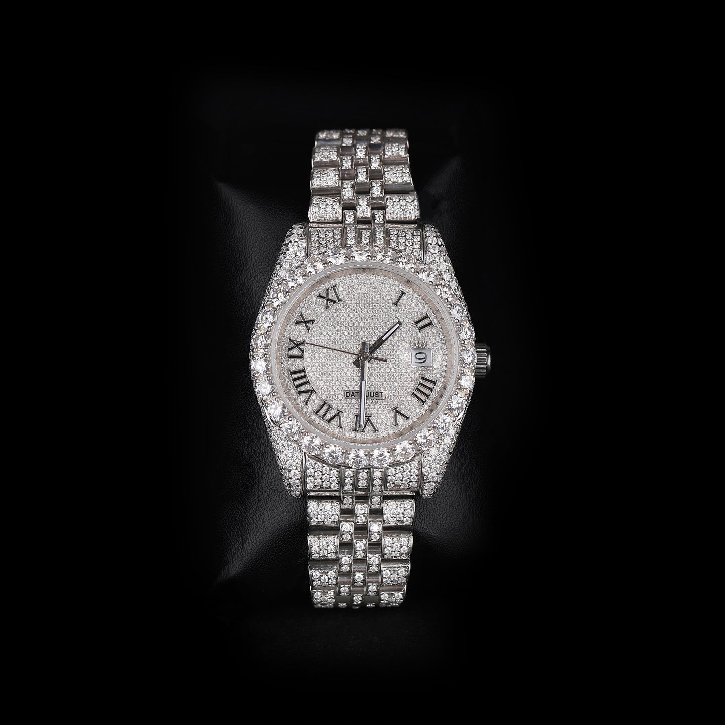 white iced out watch with roman numeral dial and full diamond shine luxury style