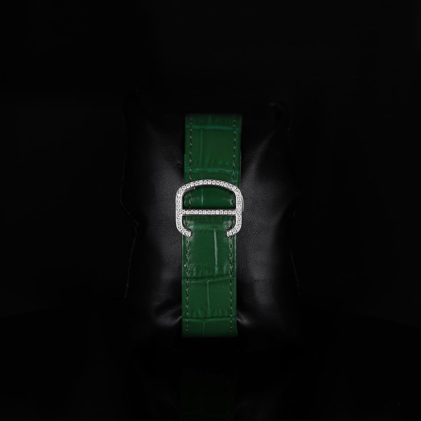 premium square wristwatch with iced bezel and green dial accents