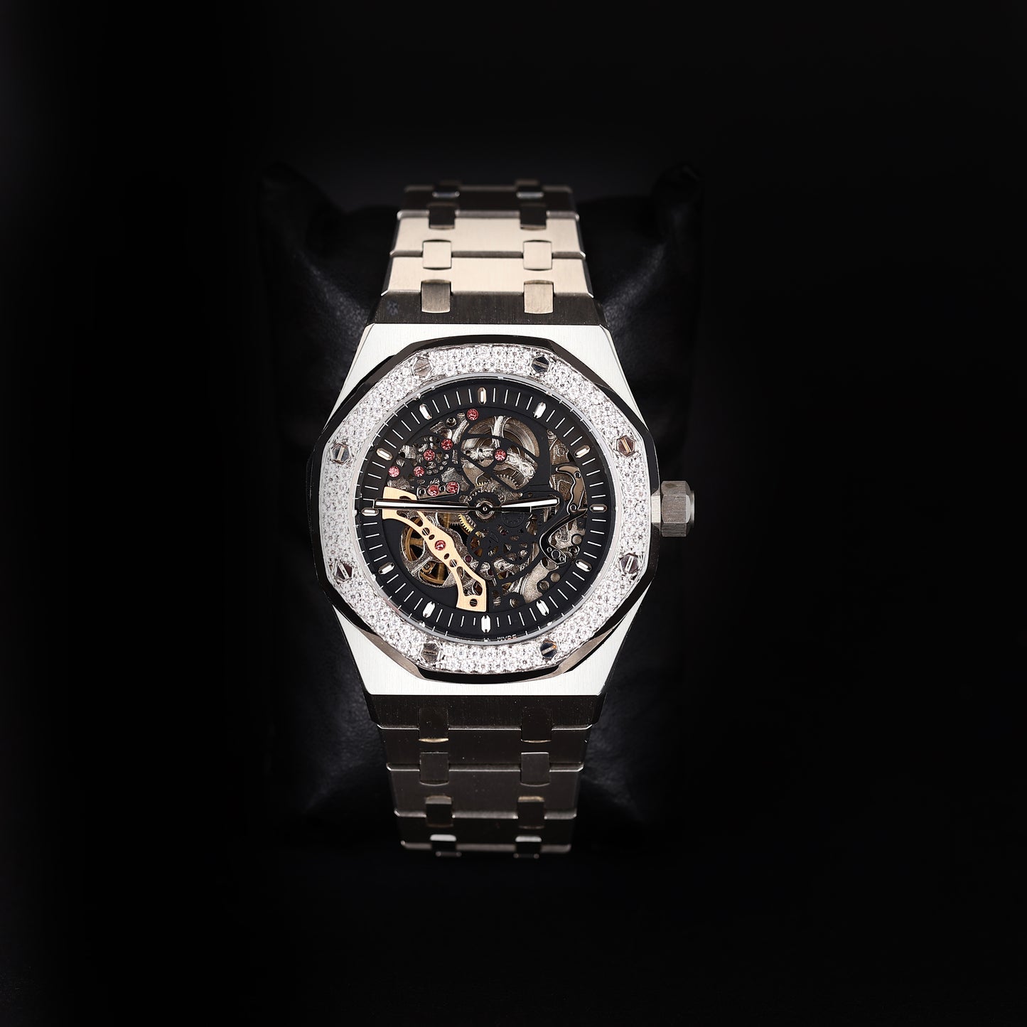 luxury skeleton automatic watch with iced bezel and stainless steel bracelet