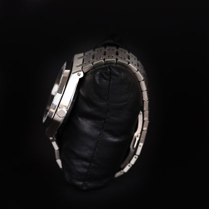 luxury wristwatch with exposed gears and diamond style bezel