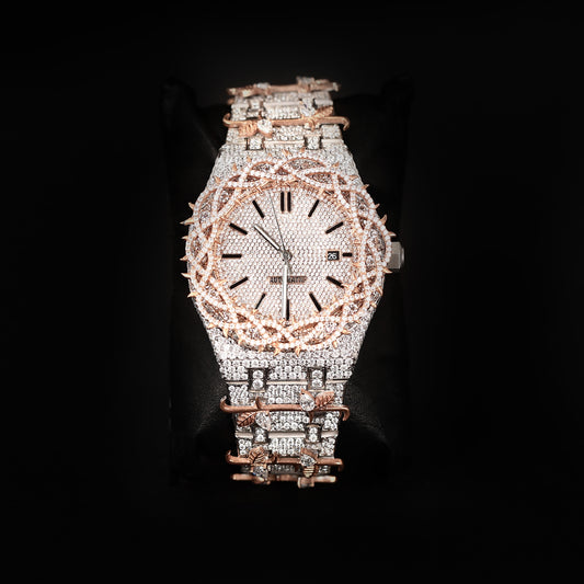 luxury iced two tone watch with rose accents and diamond covered dial